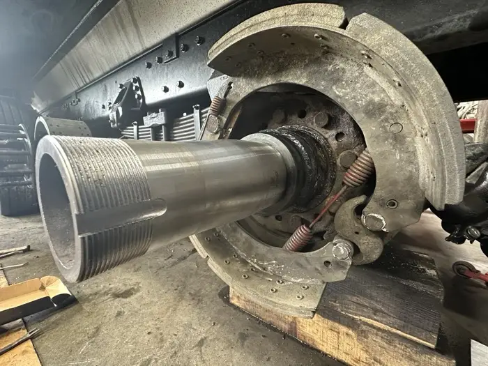 Heavy duty brake drum and axle service
